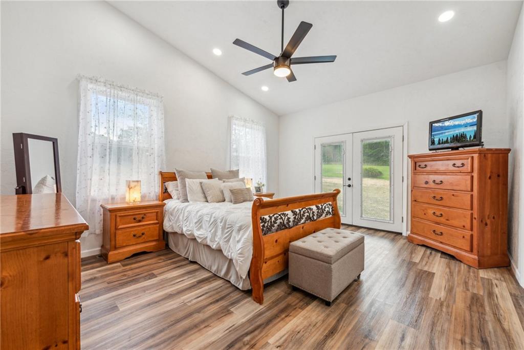1239 New Stanton Ruffsdale Road Ruffs Dale, PA 15679 - Photo 15 of 47 a bedroom with furniture and wooden floor