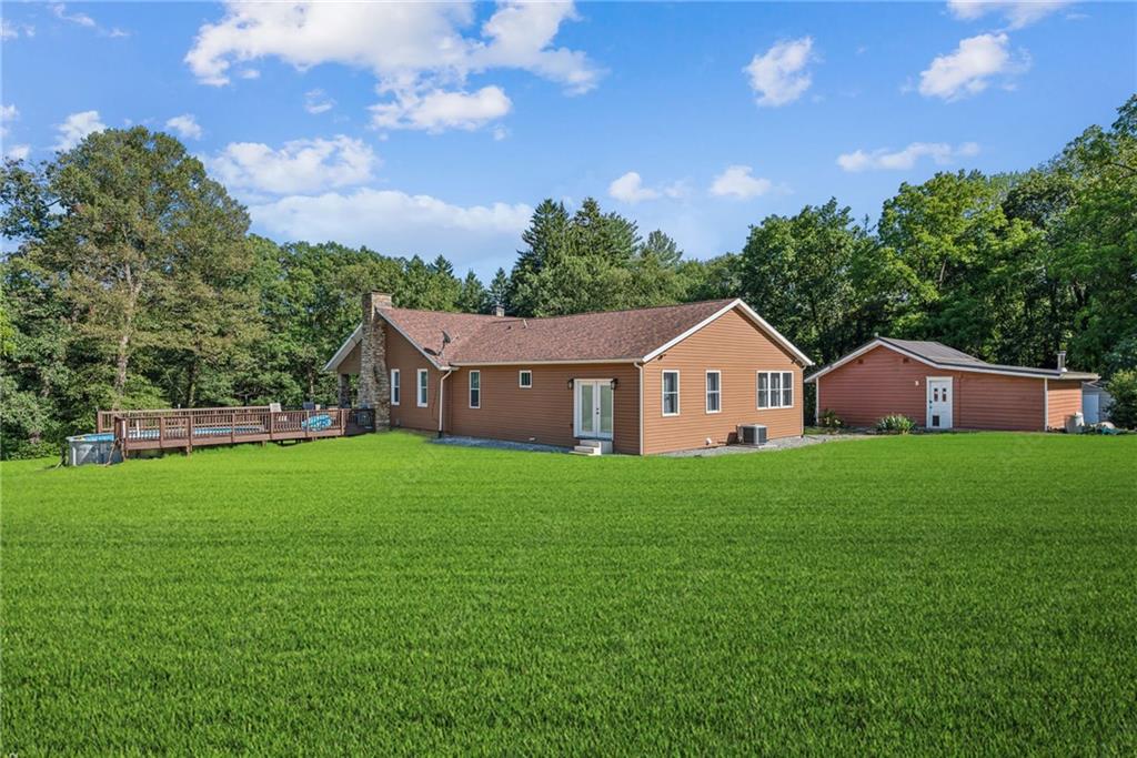 1239 New Stanton Ruffsdale Road Ruffs Dale, PA 15679 - Photo 35 of 47 a house view with a garden space