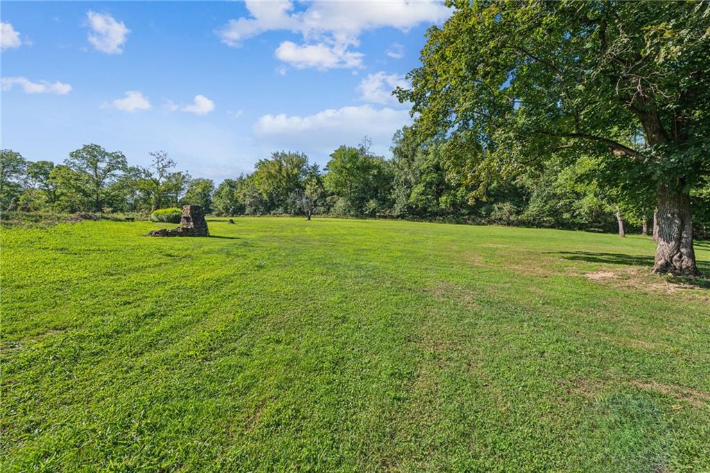 1239 New Stanton Ruffsdale Road Ruffs Dale, PA 15679 - Photo 39 of 47 a view of a field with a tree in the background