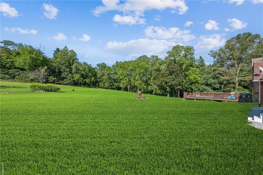 1239 New Stanton Ruffsdale Road Ruffs Dale, PA 15679 - Photo 40 of 47 a view of a green field with covered in the background