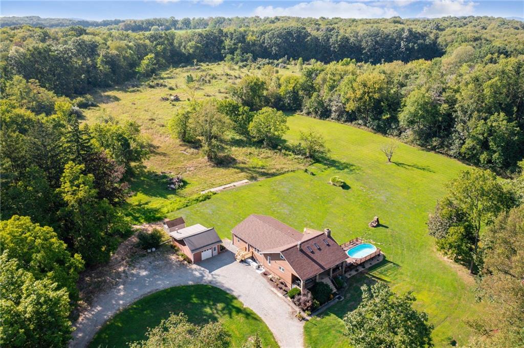 1239 New Stanton Ruffsdale Road Ruffs Dale, PA 15679 - Photo 42 of 47 an aerial view of a house with a lake view