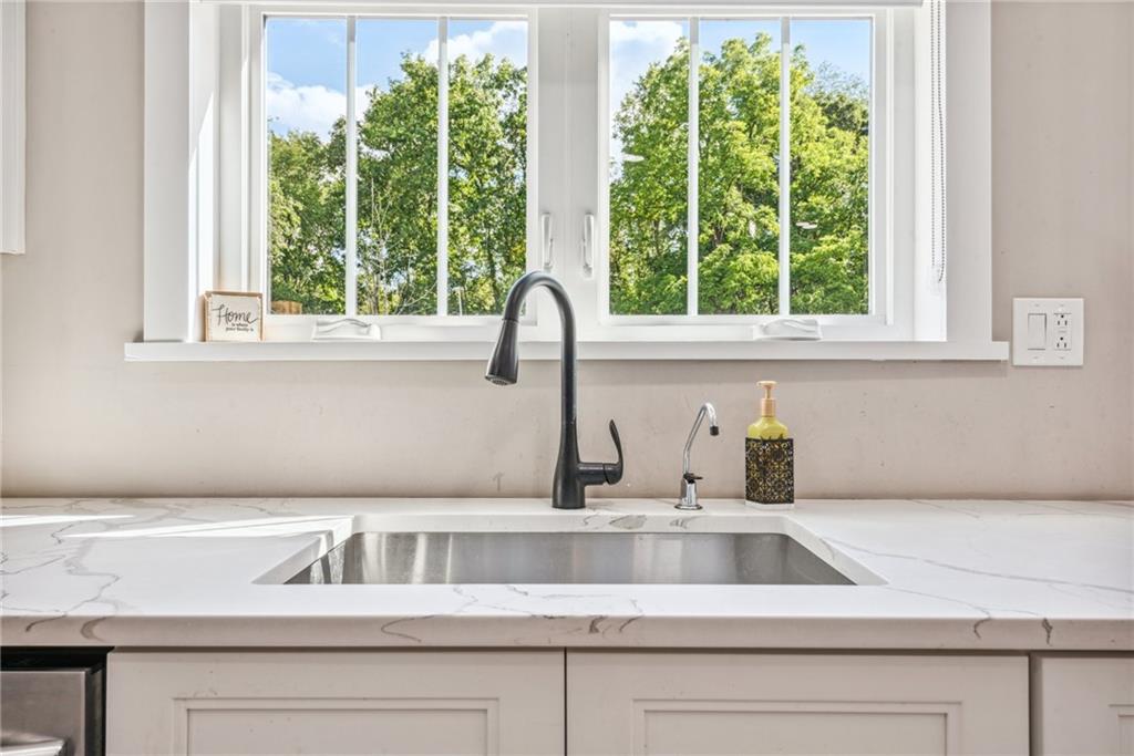 1239 New Stanton Ruffsdale Road Ruffs Dale, PA 15679 - Photo 6 of 47 a kitchen with a sink and a window