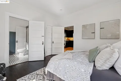 a living room with table and chairs