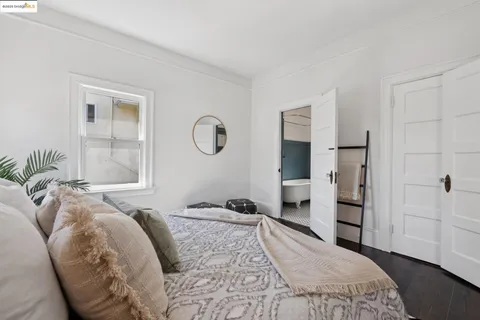 a balcony with furniture and wooden floor