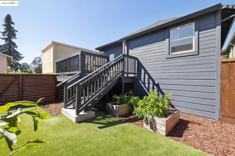 a view of a garage room with wooden walls