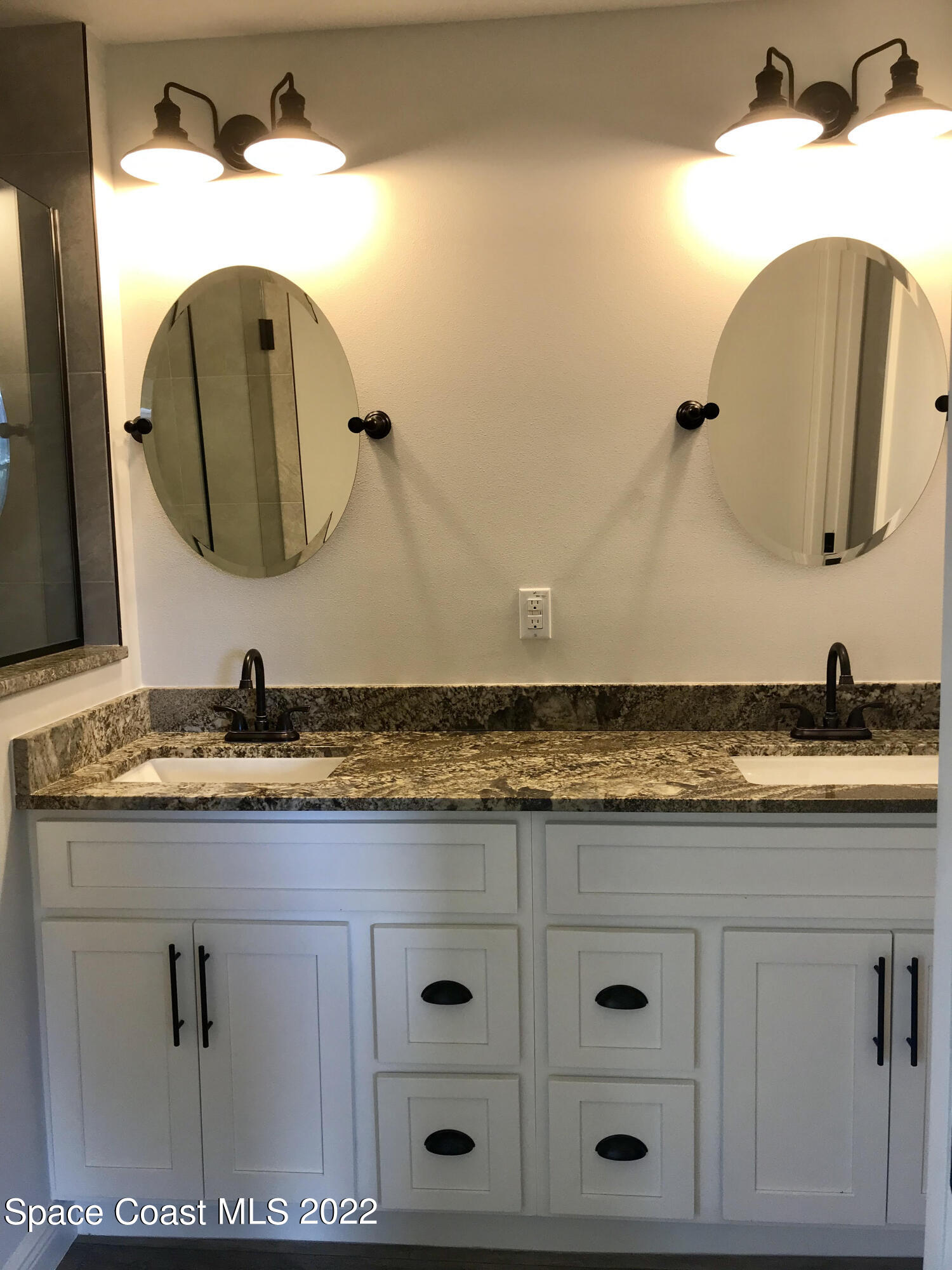 4035 Grant Line Road Mims, FL 32754 - Photo 7 of 18 a bathroom with a sink and mirror