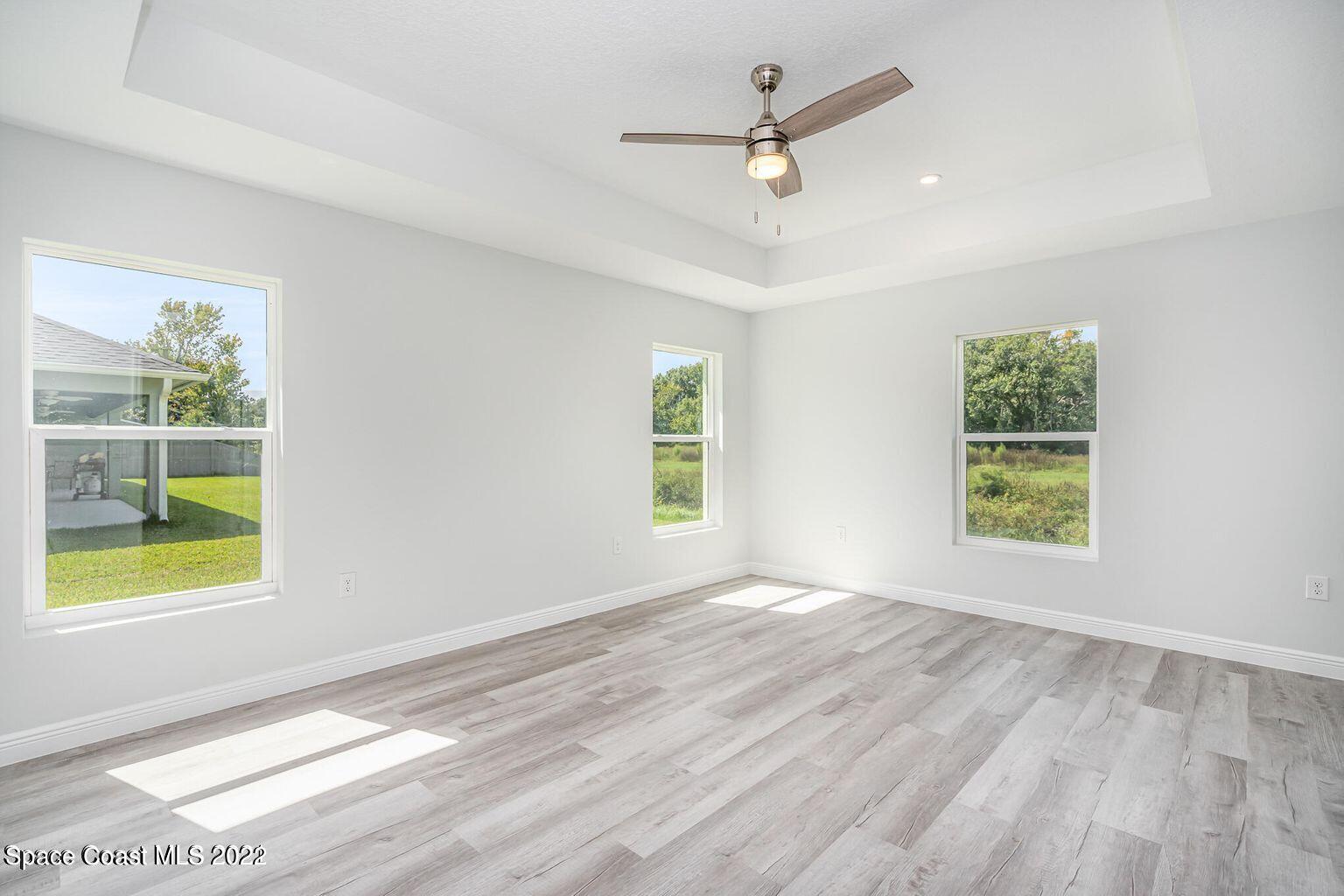 4035 Grant Line Road Mims, FL 32754 - Photo 10 of 18 a view of an empty room with a window