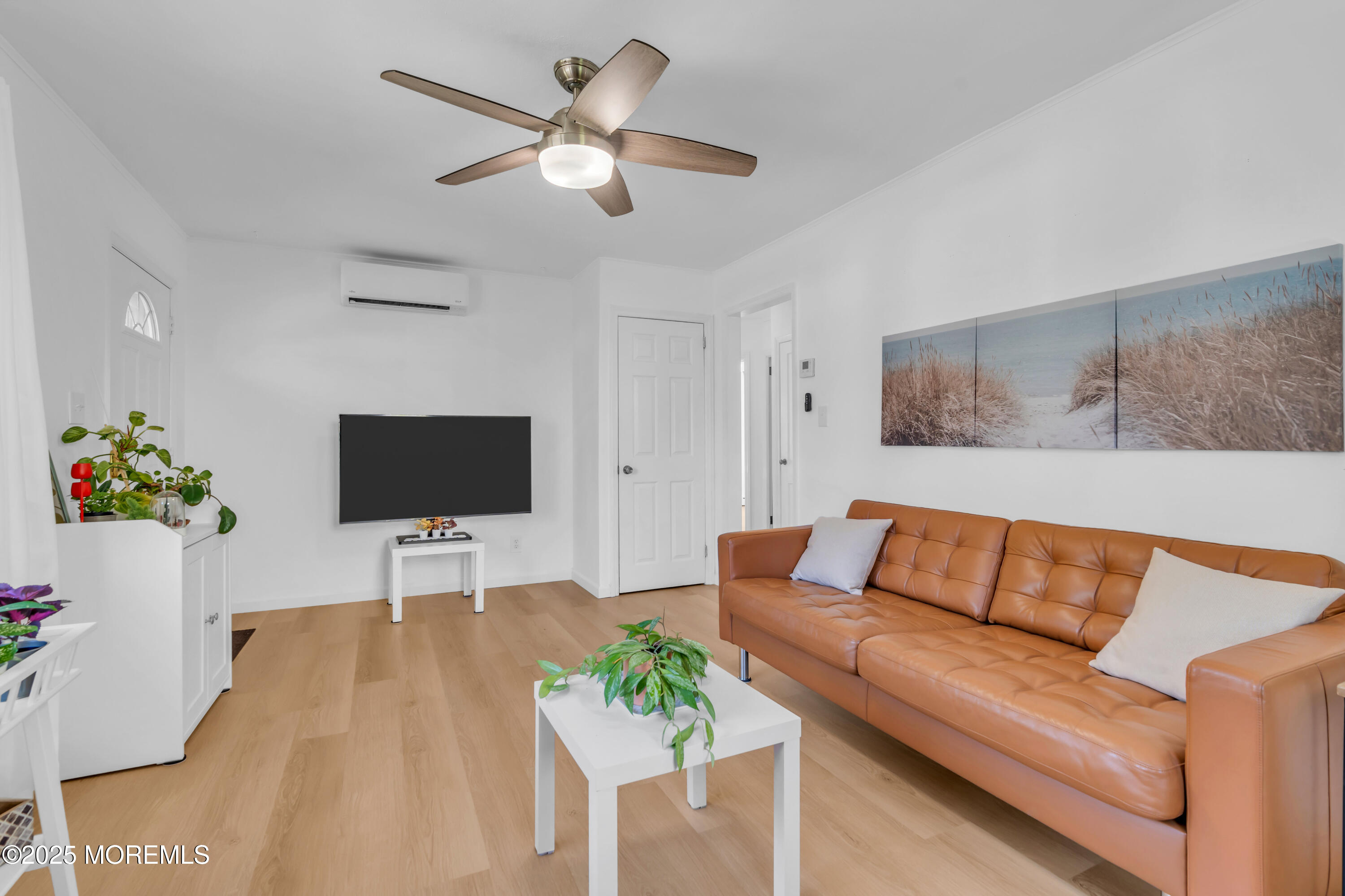 786 Leonardville Road Leonardo, NJ 07737 - Photo 8 of 38 a living room with furniture and a flat screen tv