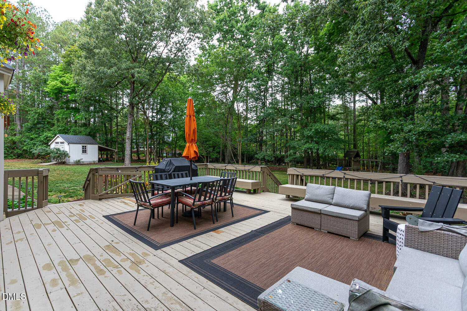 8509 Towneley Place Raleigh, NC 27615 - Photo 35 of 36 a view of a patio with couches potted plants and a large park
