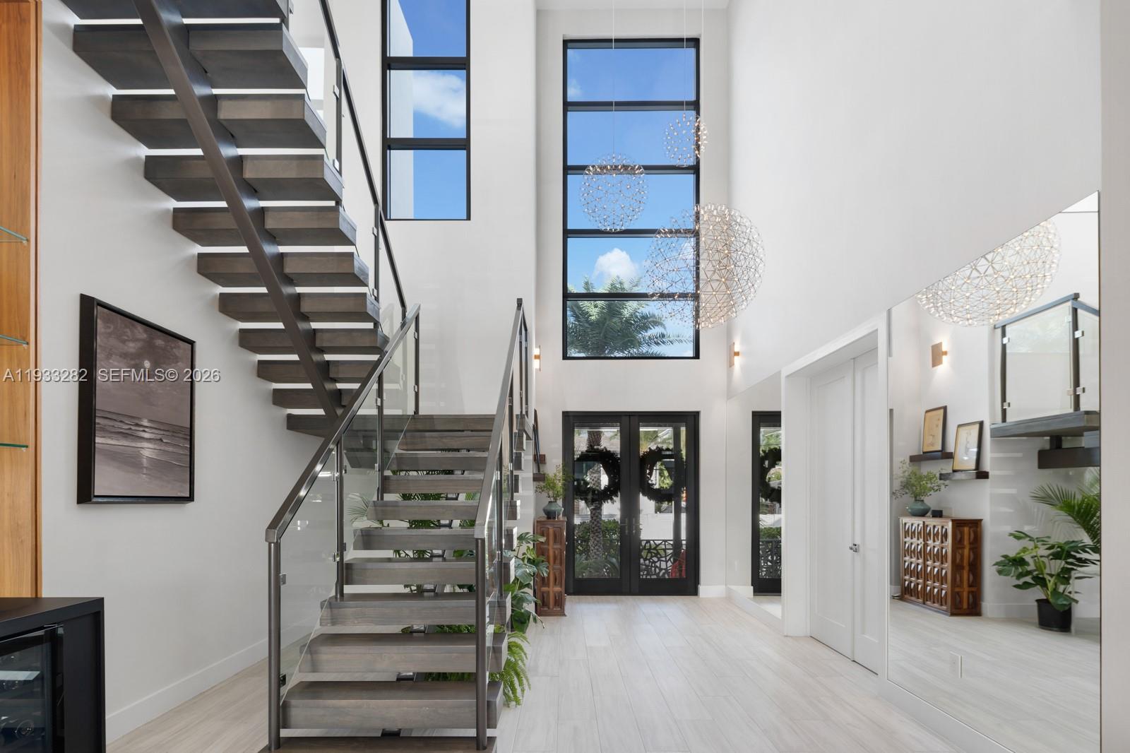 1970 Northeast 119th Road North Miami, FL 33181 - Photo 16 of 54 a view of an entryway with staircase
