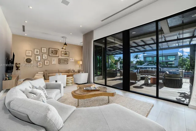 a living room with furniture rug and window