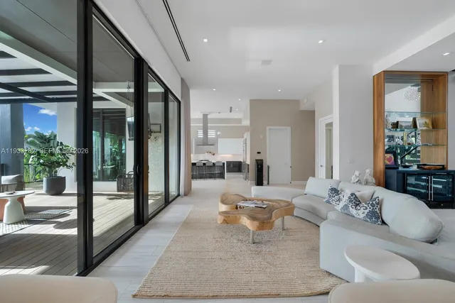 a kitchen with a table and chairs in it