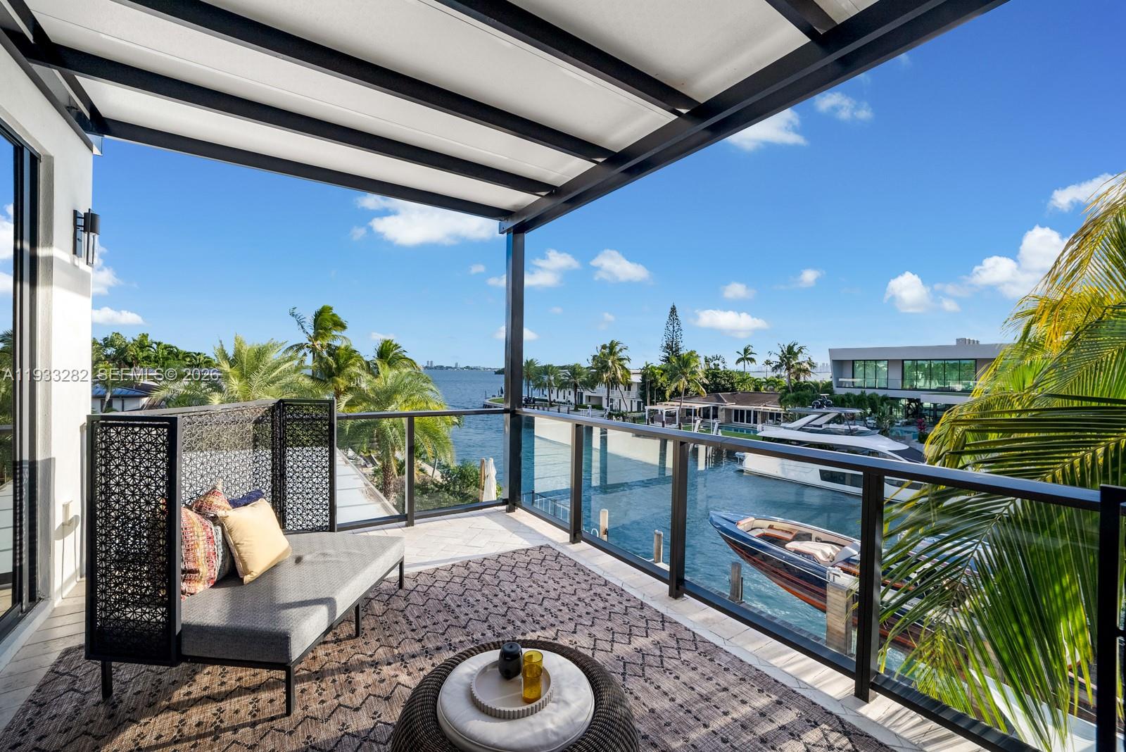 1970 Northeast 119th Road North Miami, FL 33181 - Photo 32 of 54 a outdoor living space with furniture