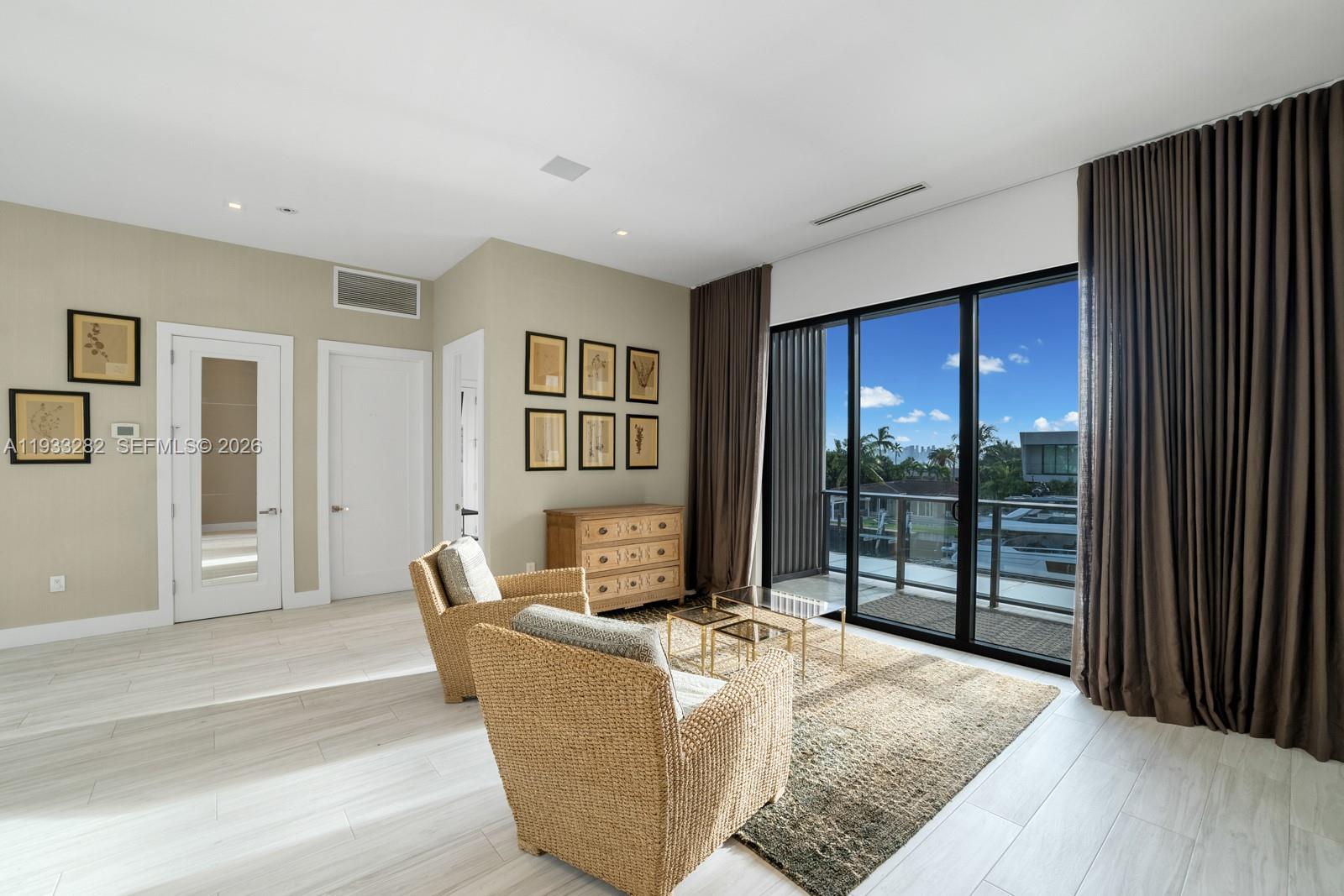 1970 Northeast 119th Road North Miami, FL 33181 - Photo 41 of 54 a living room with furniture and a window