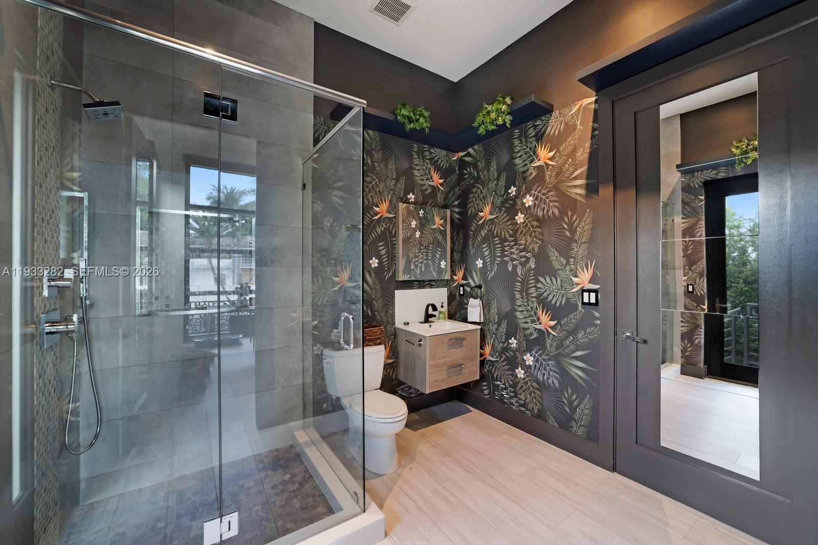 1970 Northeast 119th Road North Miami, FL 33181 - Photo 46 of 54 a bathroom with a shower