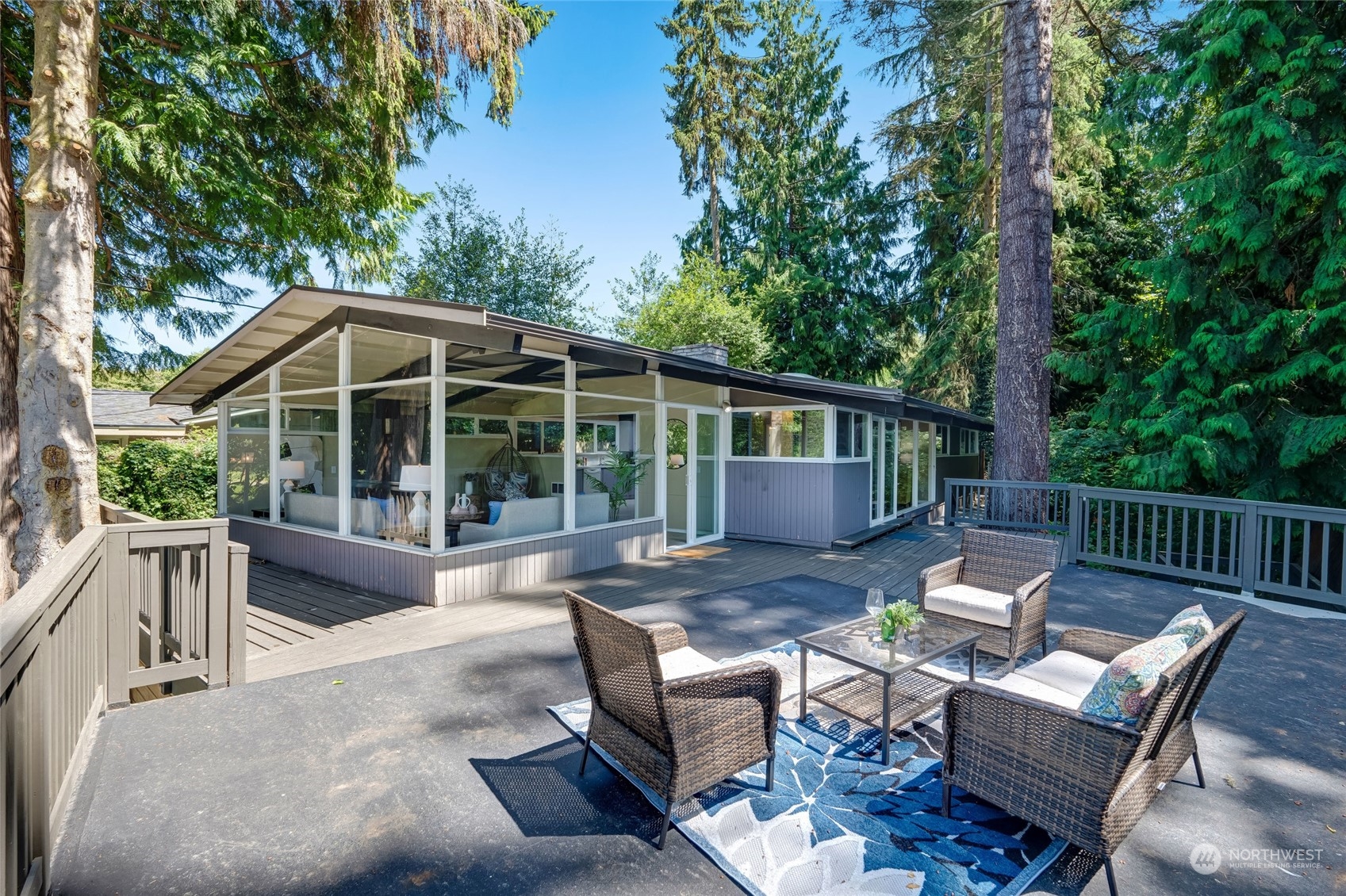 8008 Talbot Road Edmonds, WA 98026 - Photo 6 of 30 a view of a house with backyard sitting area
