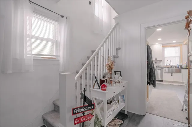 a view of entryway with a window and storage