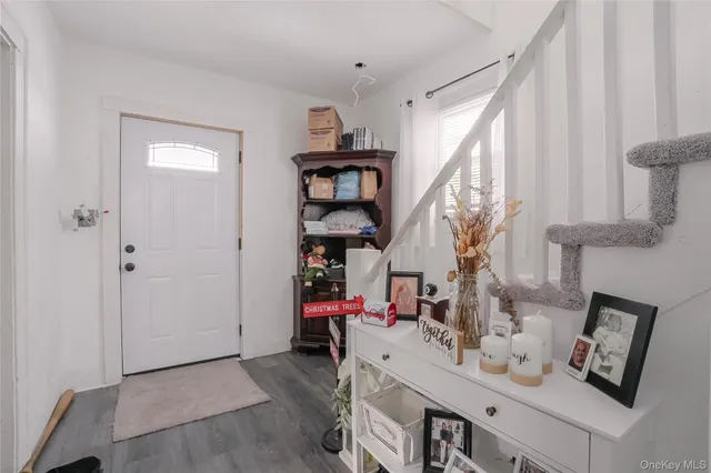 a view of living room and workspace