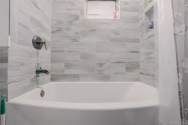 a bathroom with a bathtub