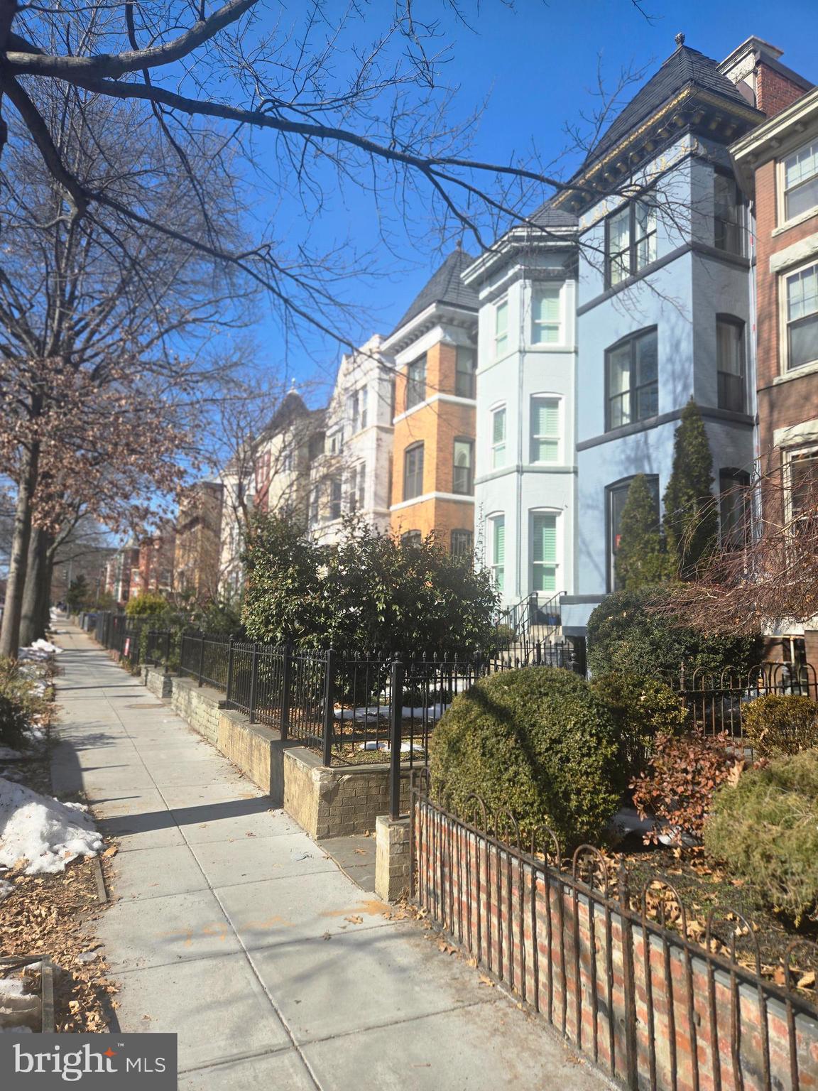 1209 Harvard Street Northwest Washington, DC 20009 - Photo 3 of 9 a view of a building with a outdoor space