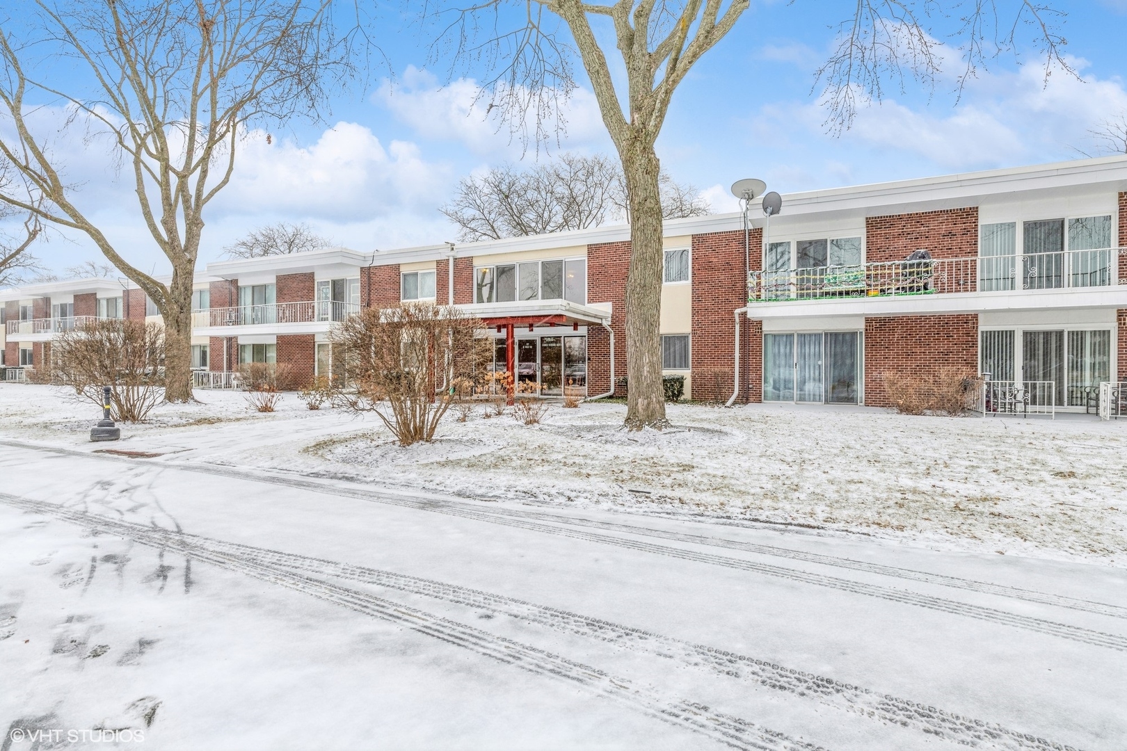 127 North Wolf Road, Unit 54B Wheeling, IL 60090 - Photo 2 of 10 a view of city with tall buildings