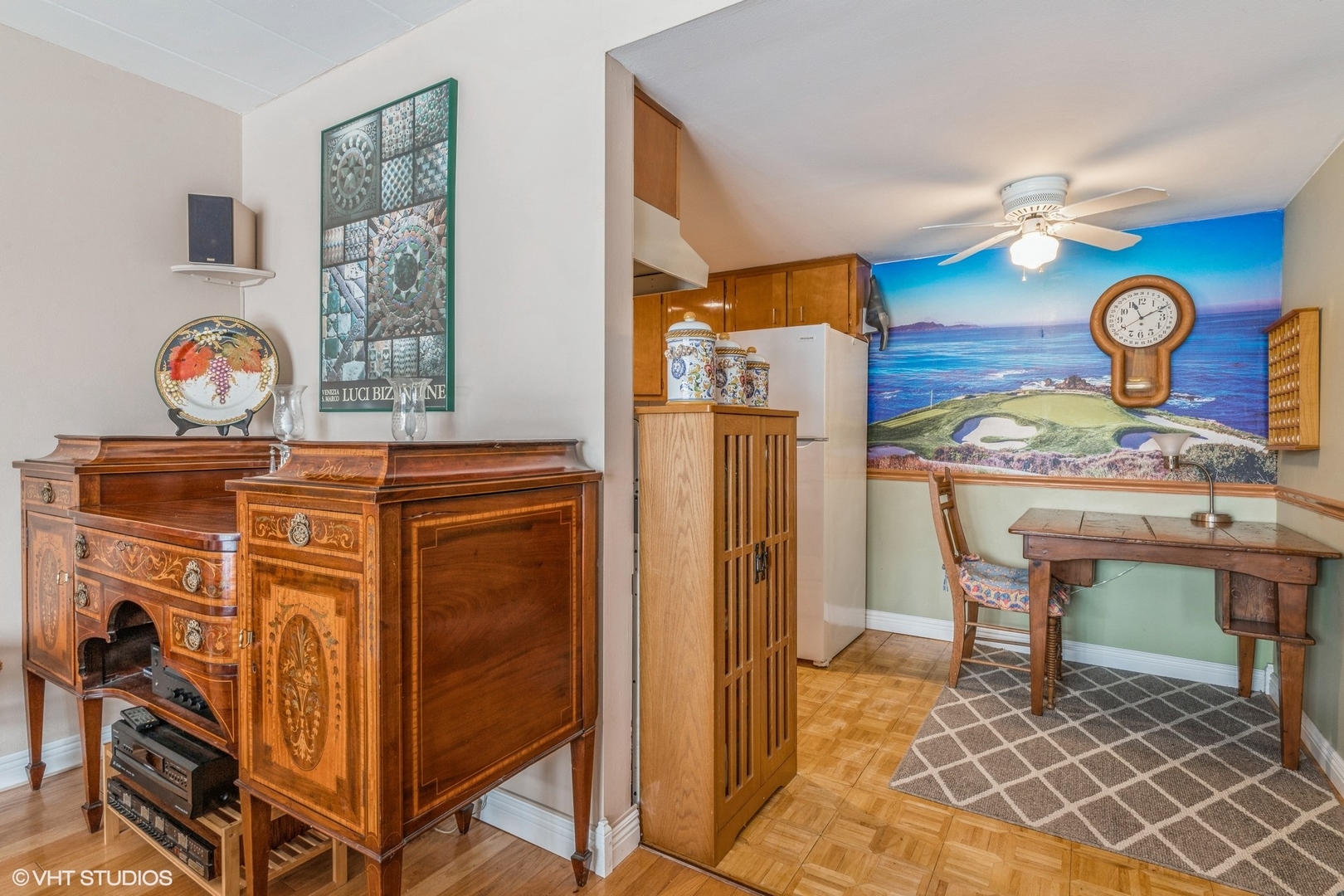 127 North Wolf Road, Unit 54B Wheeling, IL 60090 - Photo 7 of 10 a view of a kitchen with fridge and wooden floor