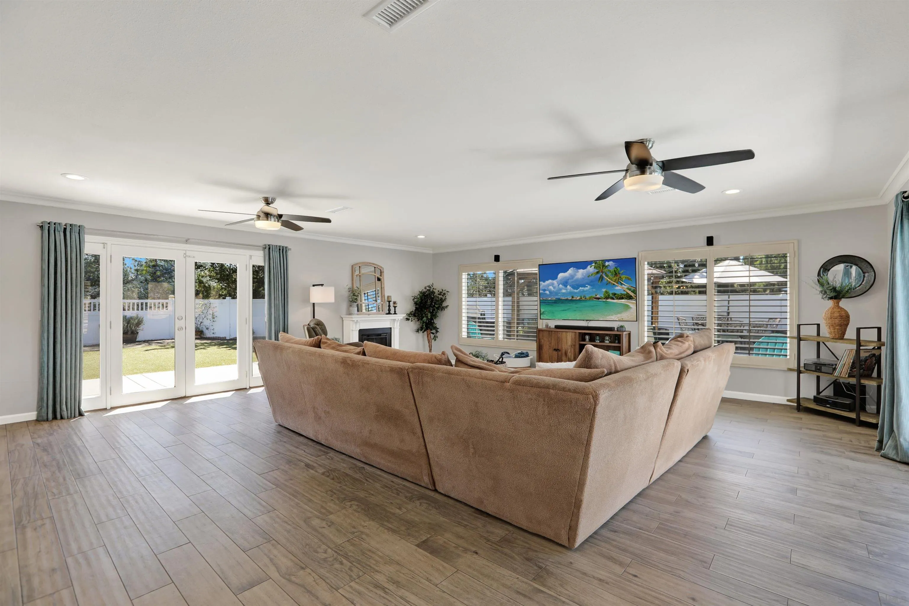 12913 Evalyn Court Poway, CA 92064 - Photo 18 of 56 a living room with furniture and a large window