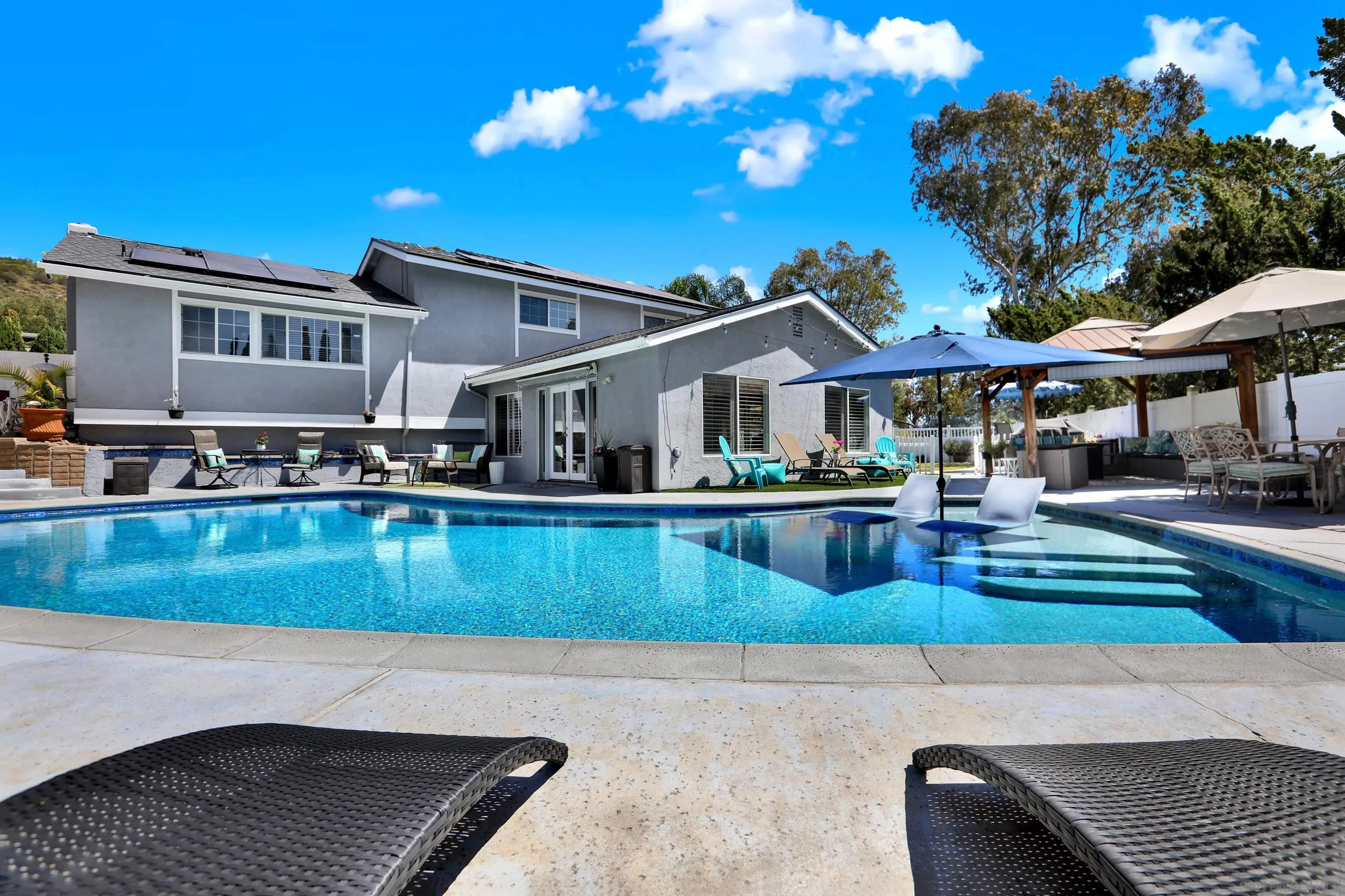 12913 Evalyn Court Poway, CA 92064 - Photo 2 of 56 a front view of a house with sitting area