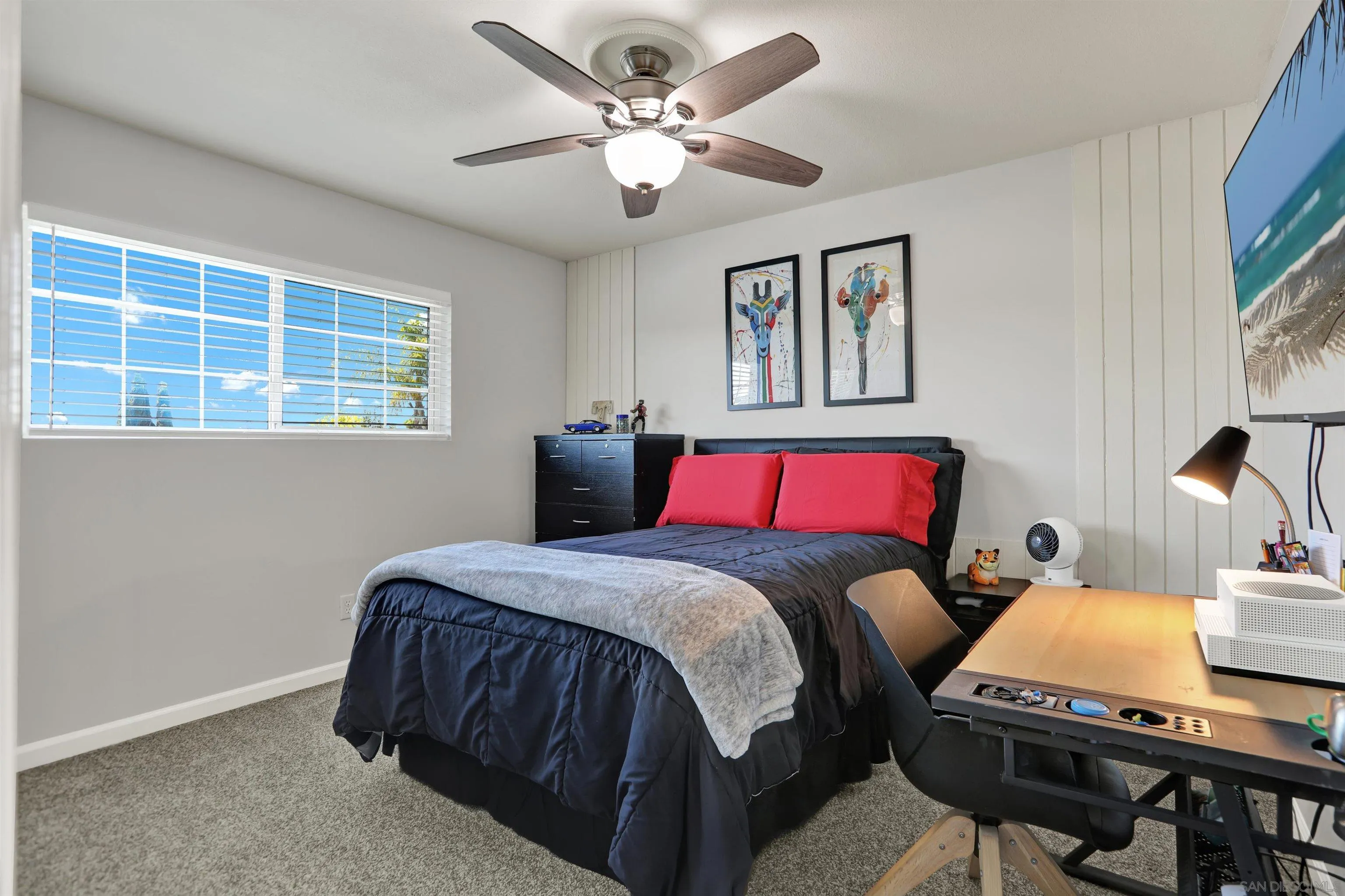 12913 Evalyn Court Poway, CA 92064 - Photo 36 of 56 a bedroom with a bed and a flat screen tv