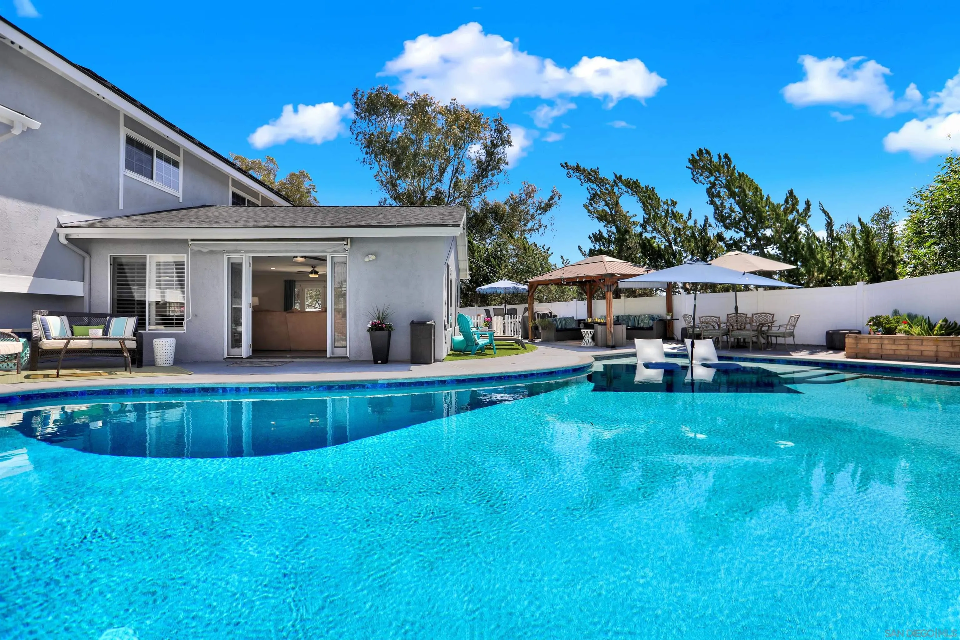 12913 Evalyn Court Poway, CA 92064 - Photo 39 of 56 a view of a house with a yard patio and swimming pool