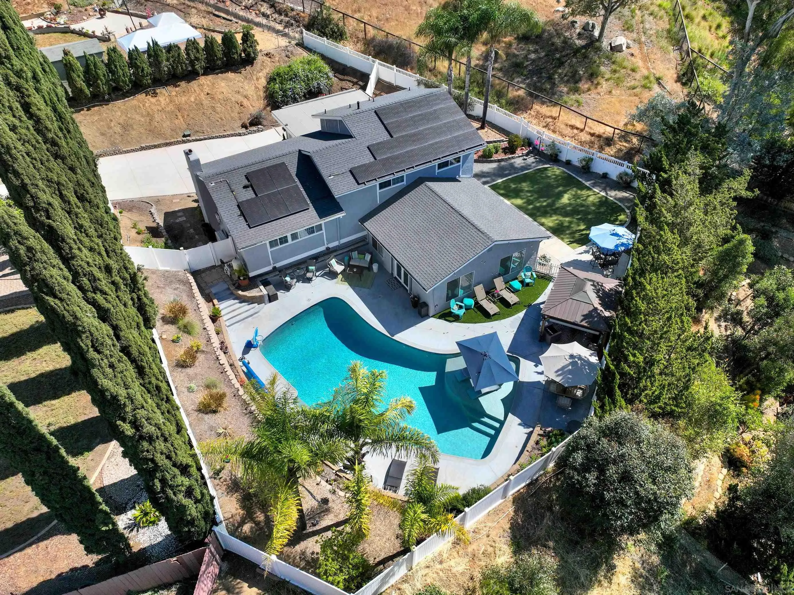 12913 Evalyn Court Poway, CA 92064 - Photo 4 of 56 an aerial view of a house with a garden