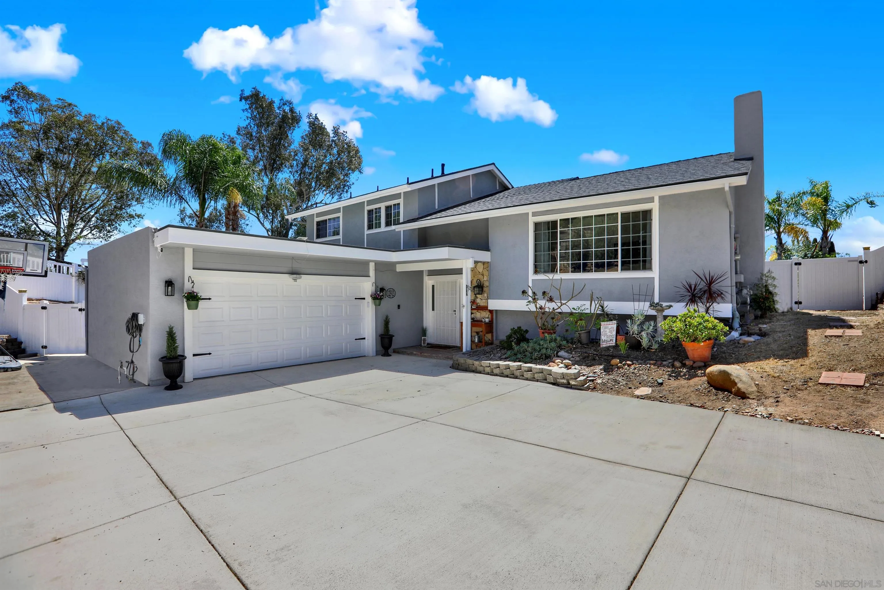 12913 Evalyn Court Poway, CA 92064 - Photo 5 of 56 a view of a house with patio