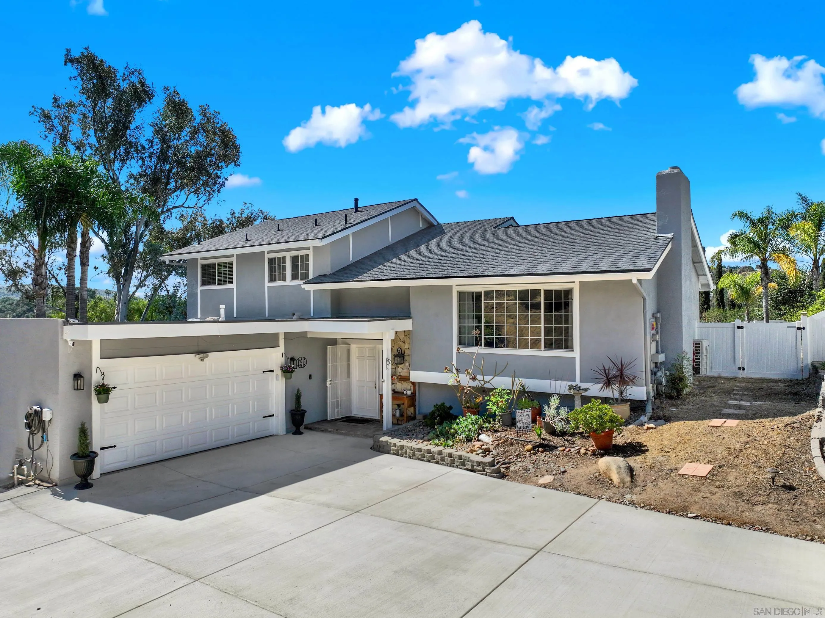 12913 Evalyn Court Poway, CA 92064 - Photo 6 of 56 a front view of a house with sitting area