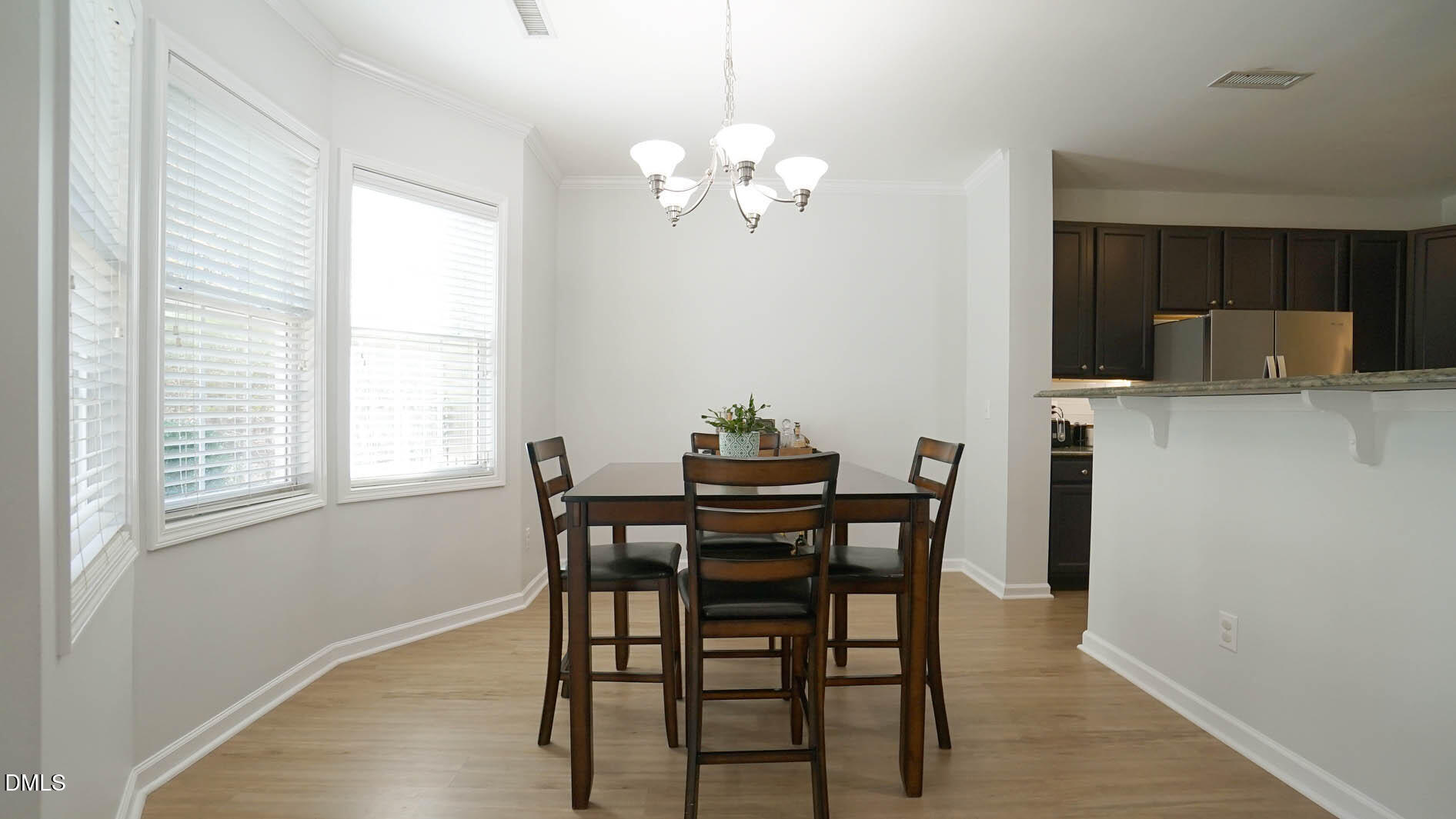 311 Inkster Cove Raleigh, NC 27603 - Photo 13 of 39 a view of a dining room with furniture and window