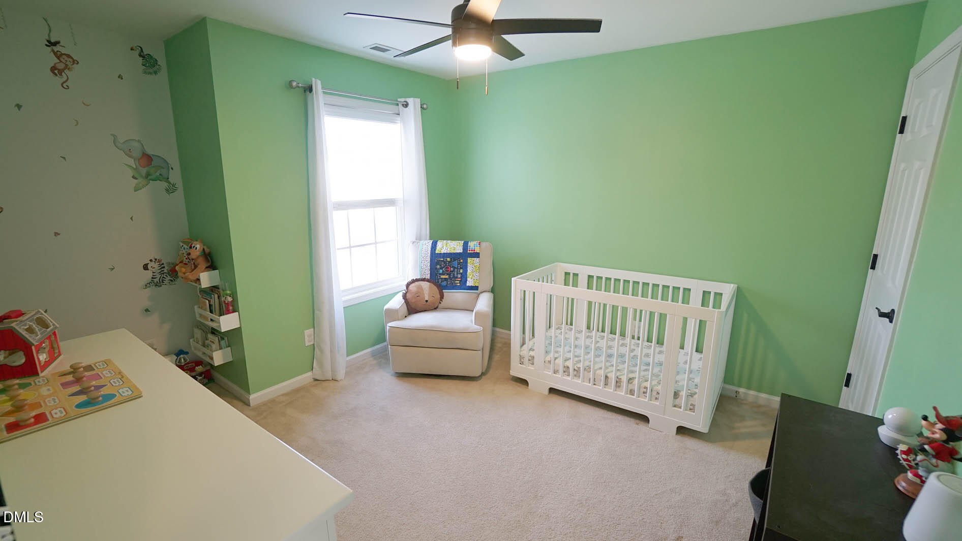 311 Inkster Cove Raleigh, NC 27603 - Photo 25 of 39 a bedroom with a bed and a window