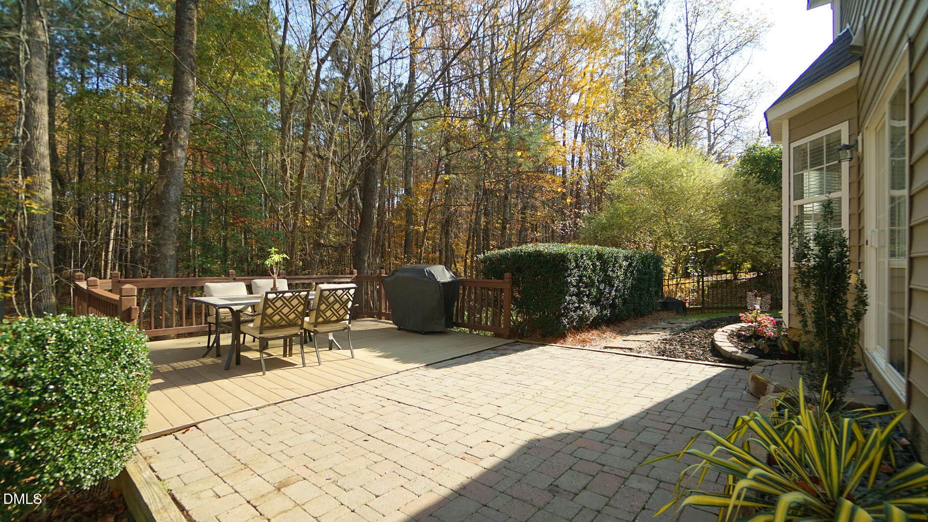 311 Inkster Cove Raleigh, NC 27603 - Photo 27 of 39 a view of a backyard with sitting area and furniture