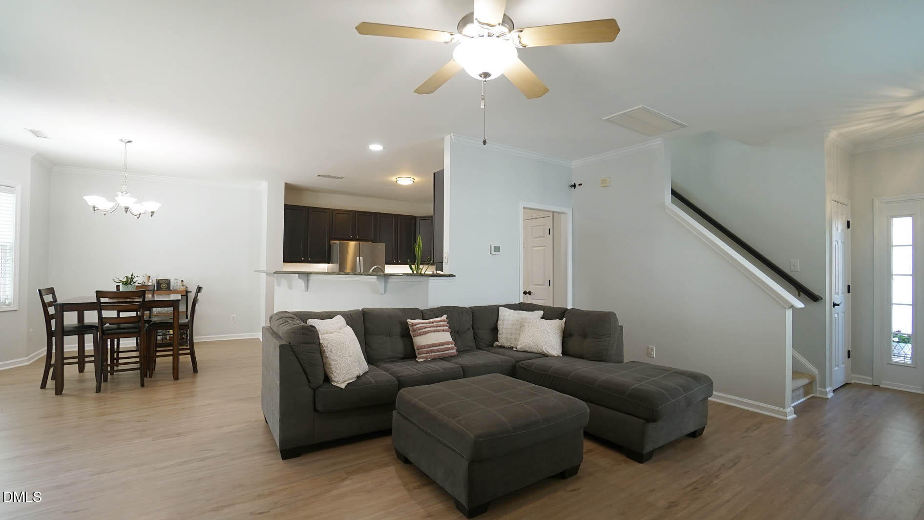 311 Inkster Cove Raleigh, NC 27603 - Photo 6 of 39 a living room with furniture and a view of kitchen