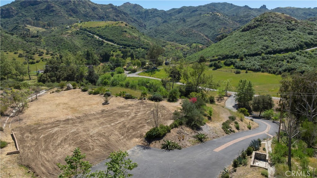 32067 Lobo Canyon Road Agoura Hills, CA 91301 - Photo 3 of 13 an aerial view of mountain with yard