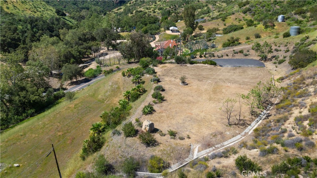 32067 Lobo Canyon Road Agoura Hills, CA 91301 - Photo 6 of 13 a view of a yard with plants