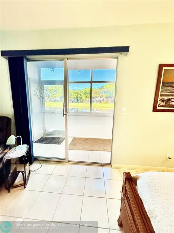 42 Tilford C, Unit 42 Deerfield Beach, FL 33442 - Photo 18 of 50 a view of an empty room with a window