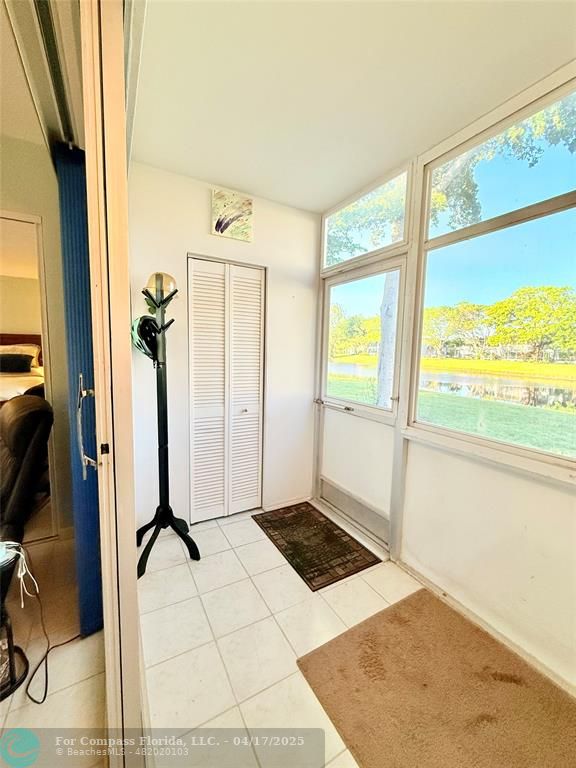42 Tilford C, Unit 42 Deerfield Beach, FL 33442 - Photo 21 of 50 a view of a bedroom with a large window