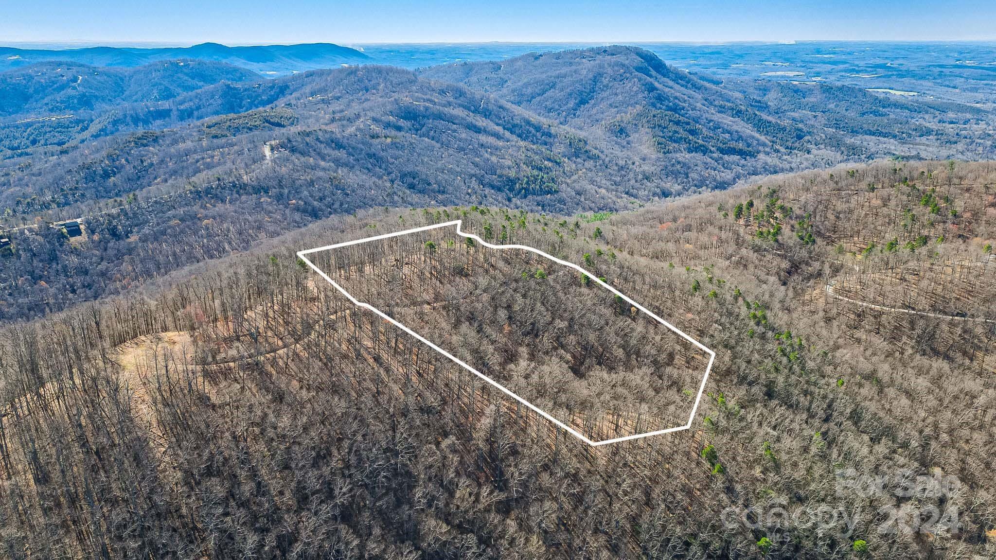 0 Locust Rd Union Mills Bostic, NC 28018 - Photo 5 of 24 a view of a backyard with wooden fence