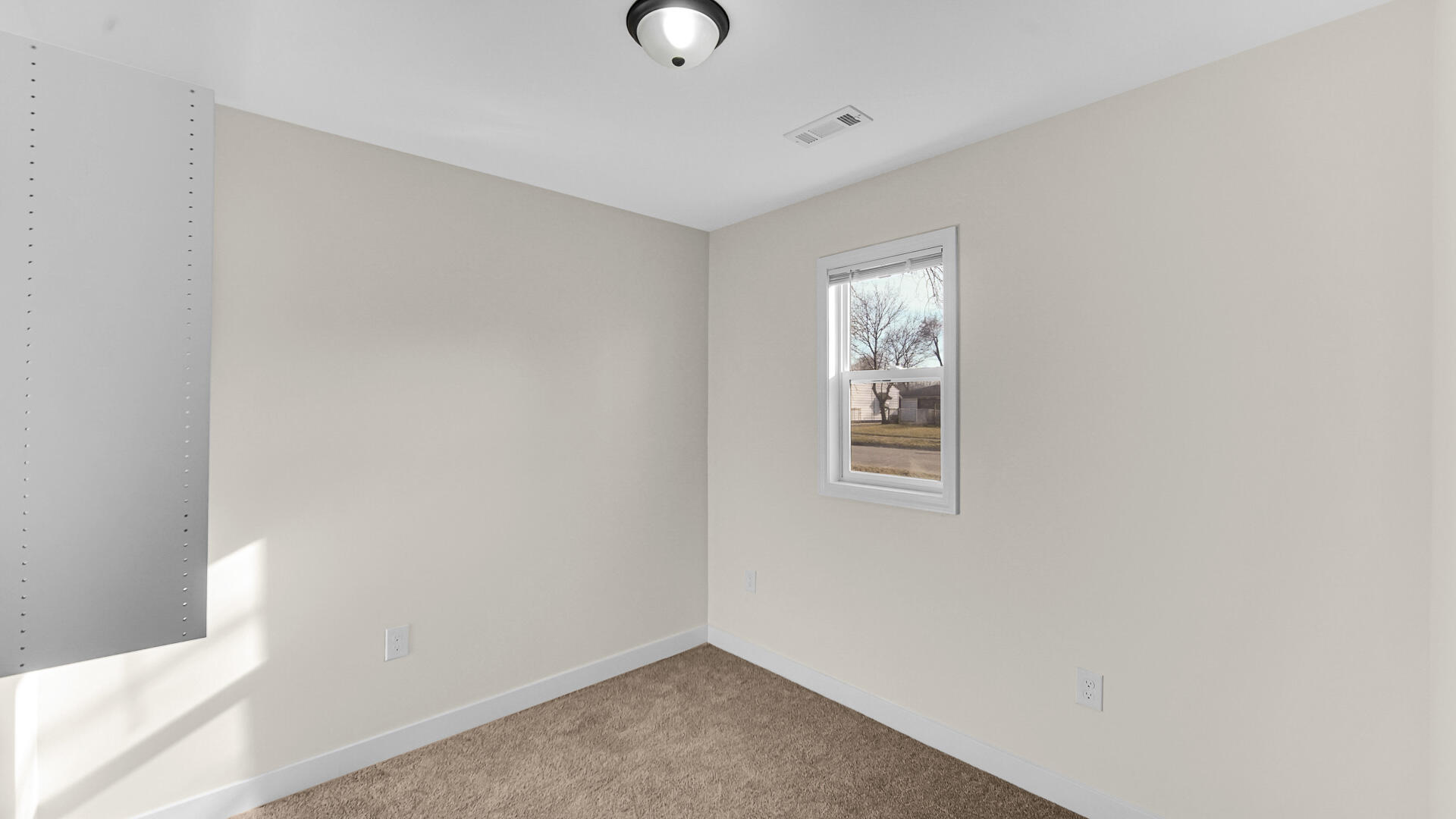 1954 Central Drive Gary, IN 46407 - Photo 17 of 22 a view of an empty room with window