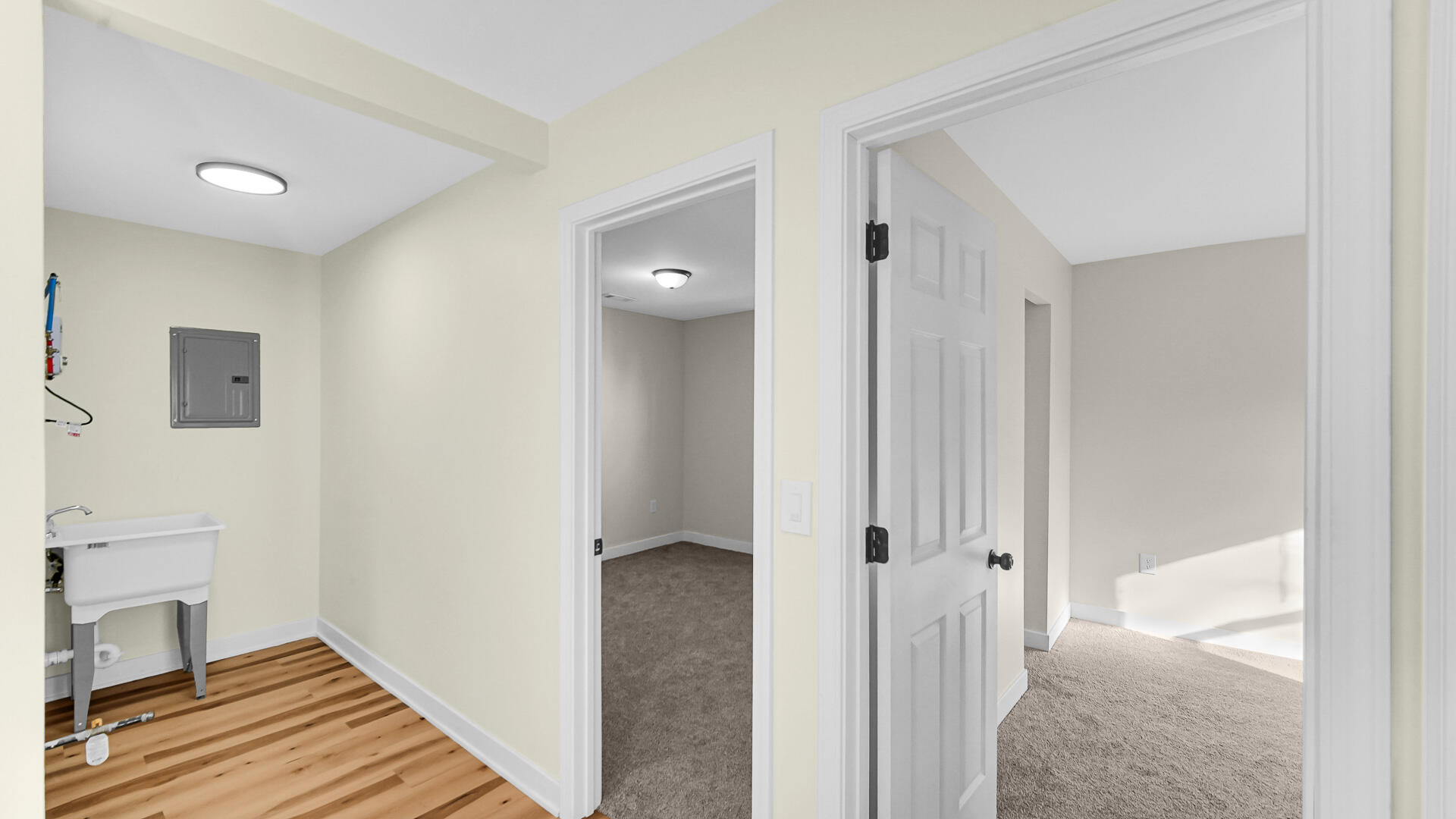 1954 Central Drive Gary, IN 46407 - Photo 19 of 22 a view of a hallway with wooden floor and a bathroom