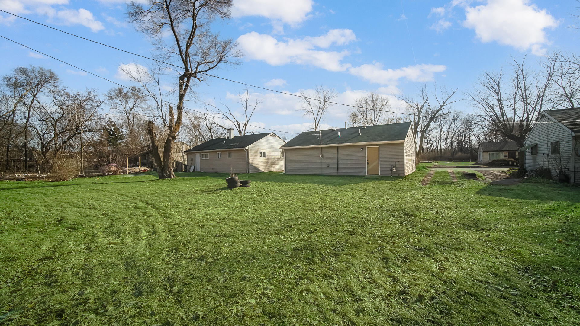 1954 Central Drive Gary, IN 46407 - Photo 21 of 22 a view of a backyard with a garden