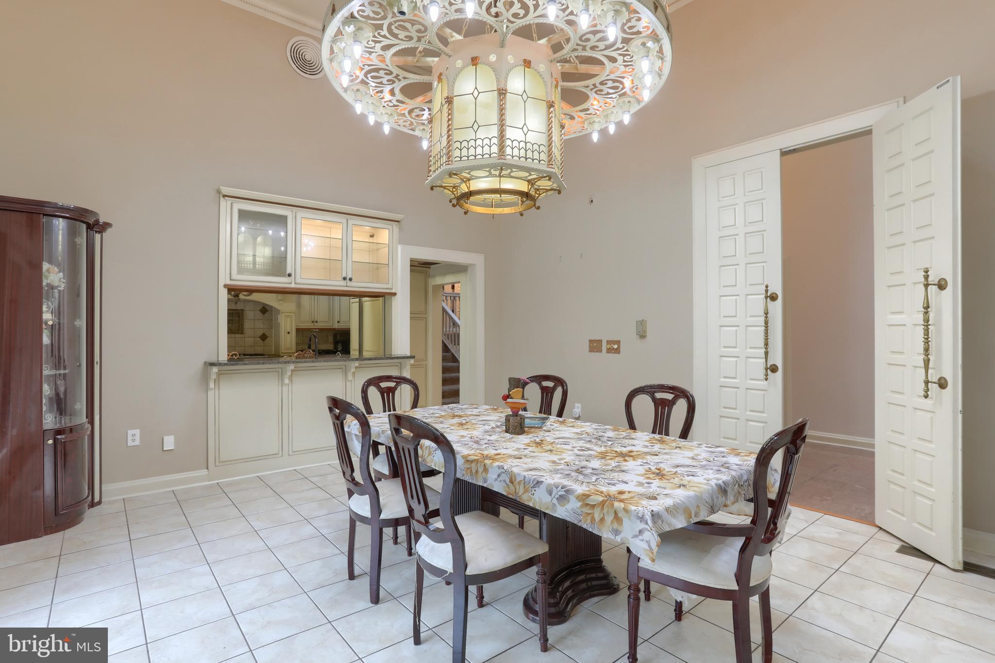 4122 Crestview Road Harrisburg, PA 17112 - Photo 13 of 71 a view of a dining room with furniture a chandelier and wooden floor