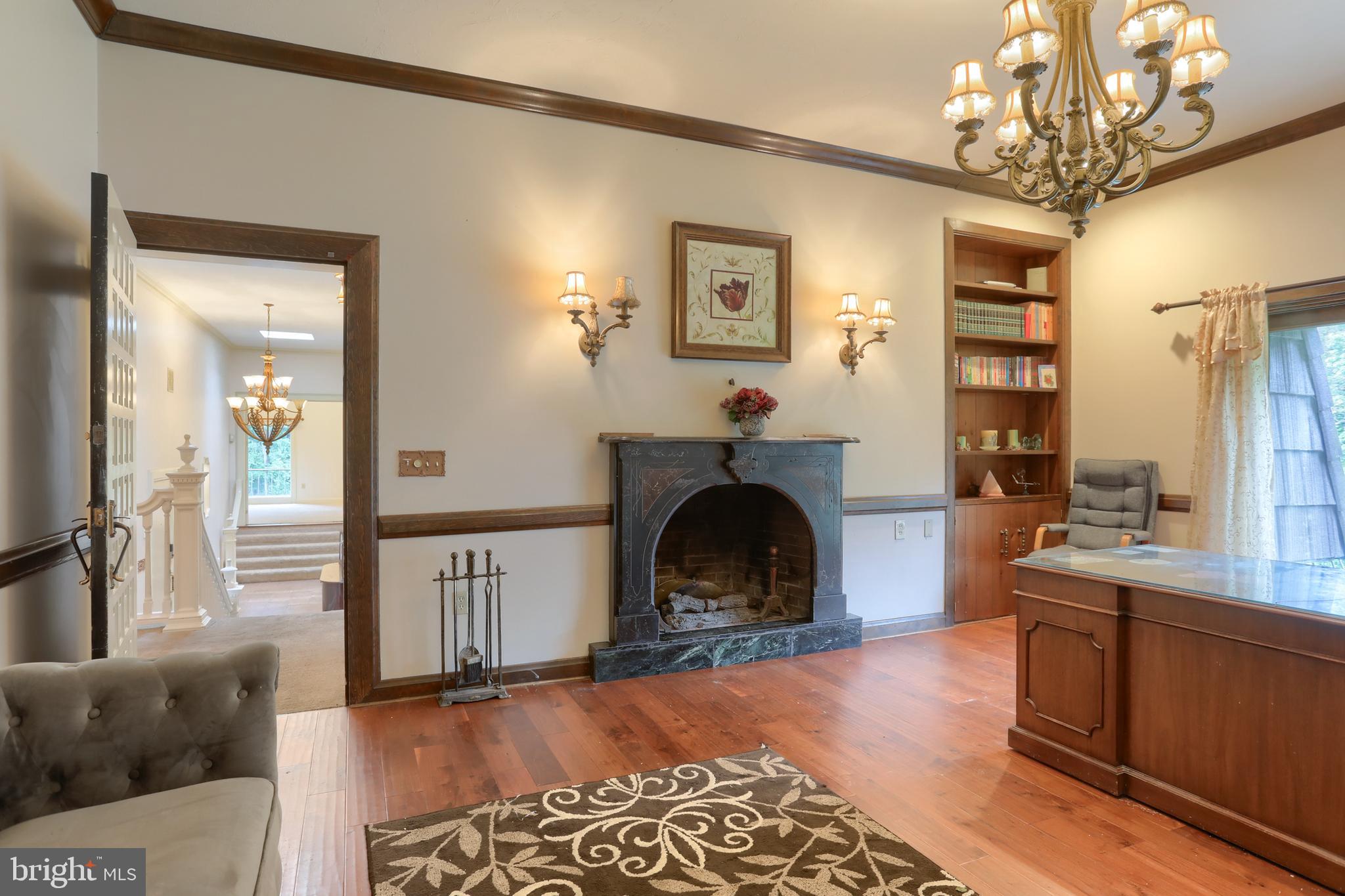 4122 Crestview Road Harrisburg, PA 17112 - Photo 19 of 71 a living room with furniture and a fireplace