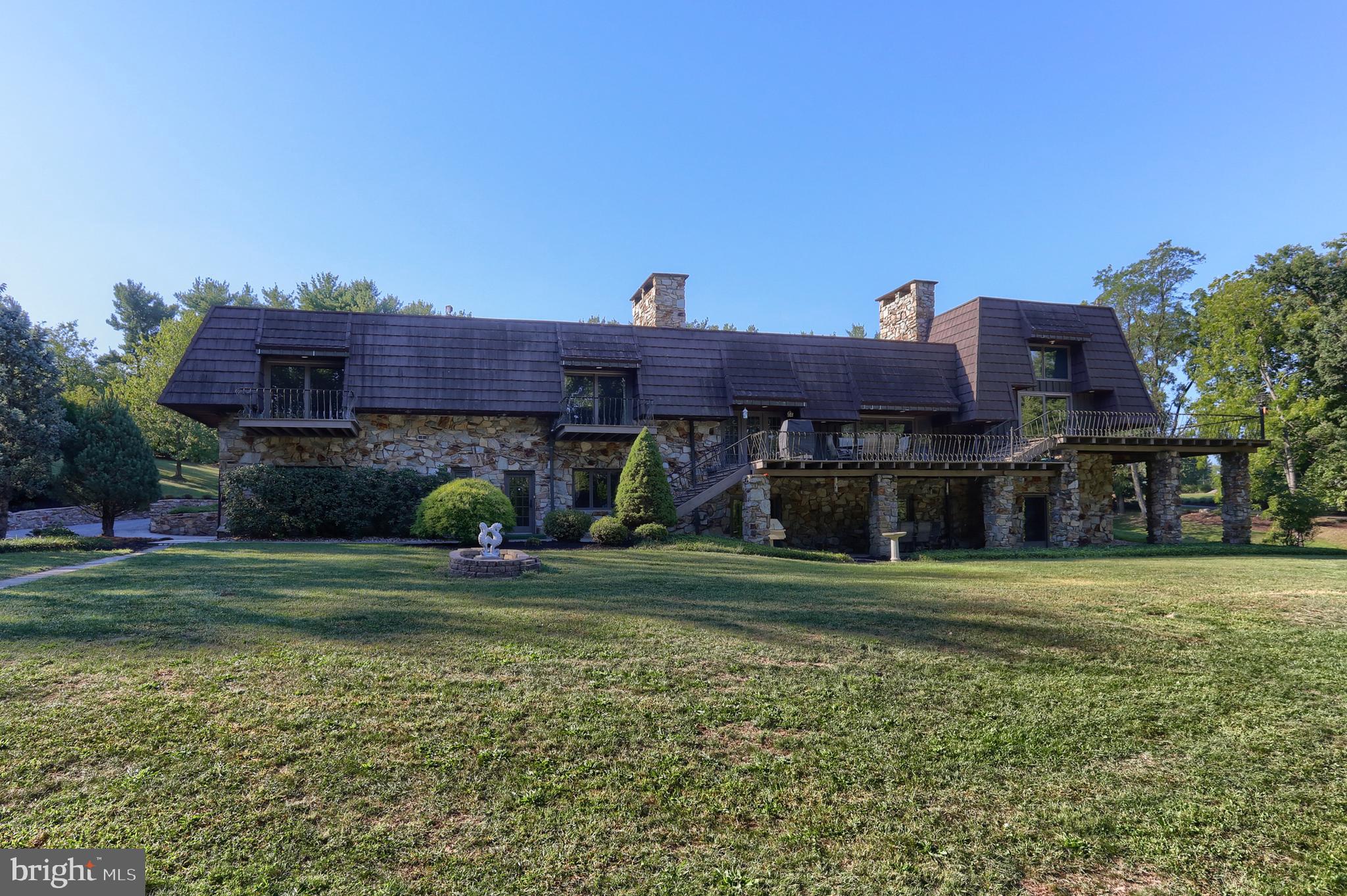 4122 Crestview Road Harrisburg, PA 17112 - Photo 3 of 71 a view of a big house with a big yard and a large tree