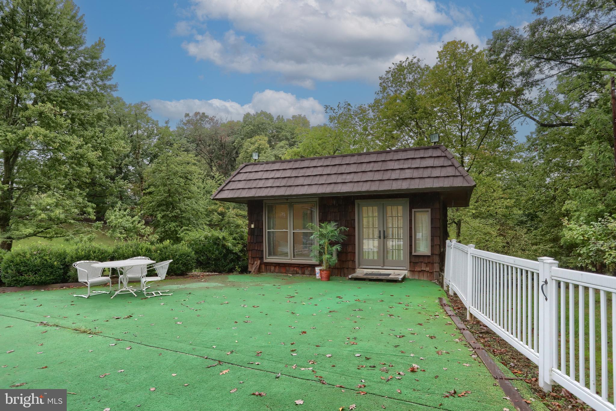 4122 Crestview Road Harrisburg, PA 17112 - Photo 55 of 71 a view of a house with wooden deck and a yard
