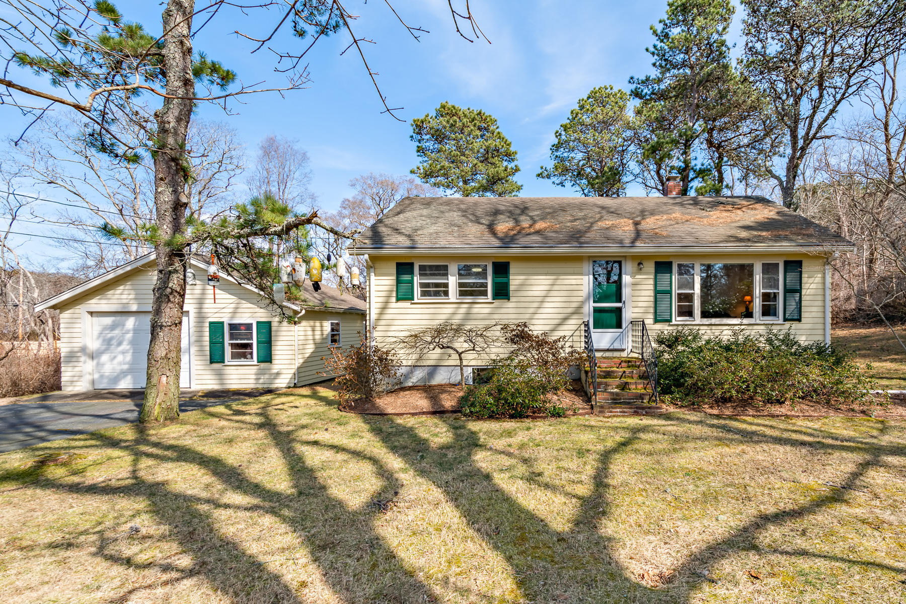 a front view of a house with a yard